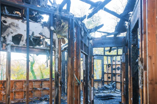burned-wooden-wall-home-after-fire-and-burned-ever-2026-01-09-08-57-52-utc (1)