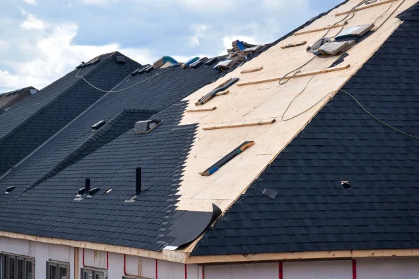 closeup-installation-of-black-roof-shingles-on-new-2026-01-09-00-59-16-utc