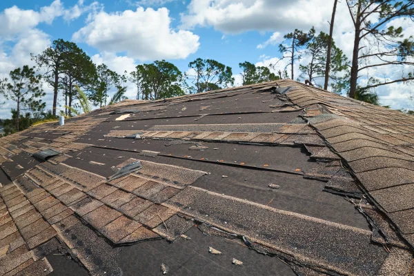 damaged-house-roof-with-missing-shingles-after-hur-2026-01-06-10-36-54-utc