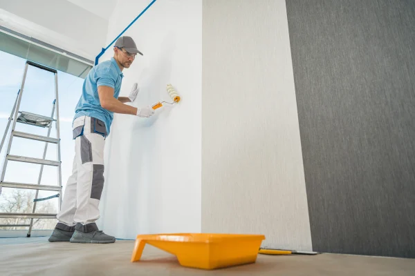 men-applying-vinyl-wallpaper-in-a-room-2026-01-09-08-38-22-utc